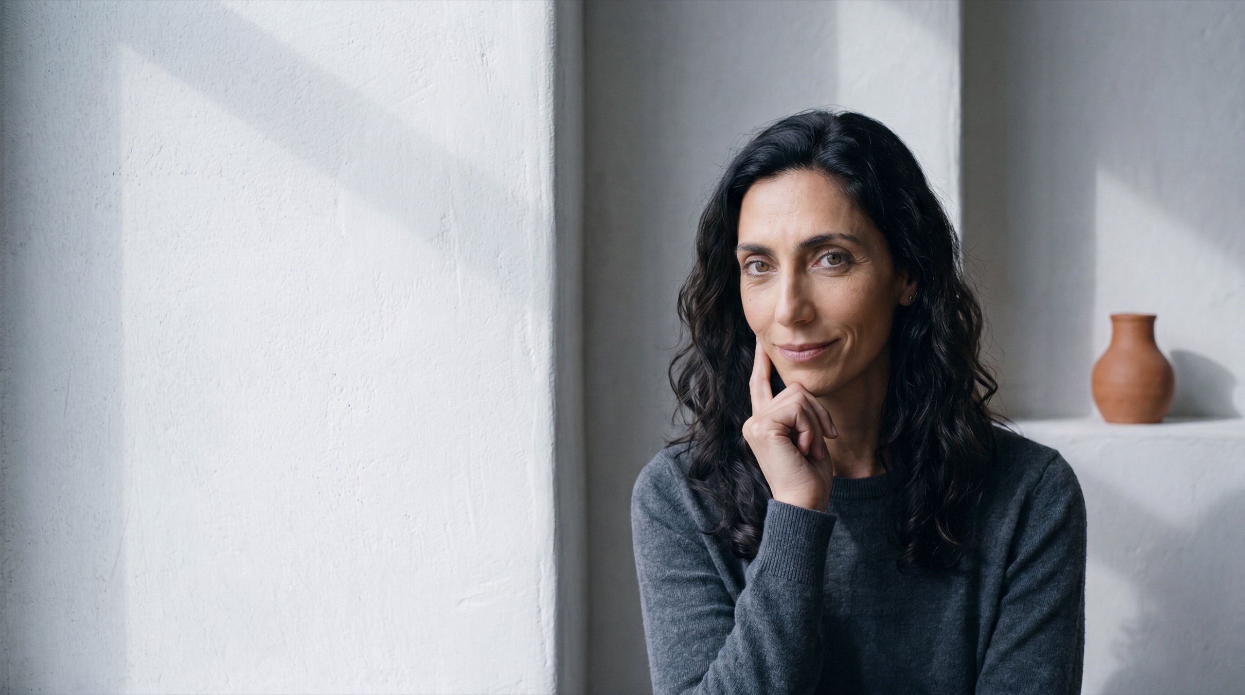 Elura — thoughtful woman beginning to understand what's changed in midlife